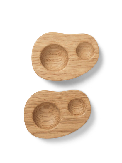 Two wooden snack plates with a natural finish on a white background