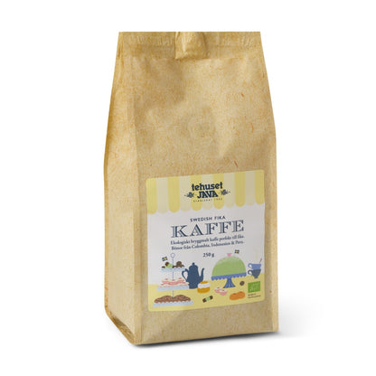 Brown paper bag with a coffee label on a white background