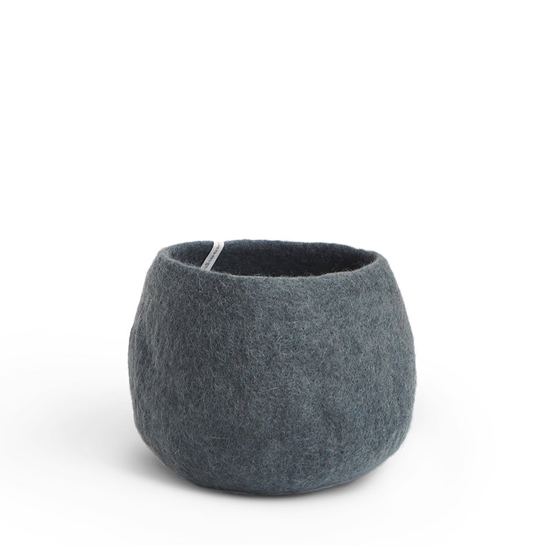 Gray felted wool planter on a white background