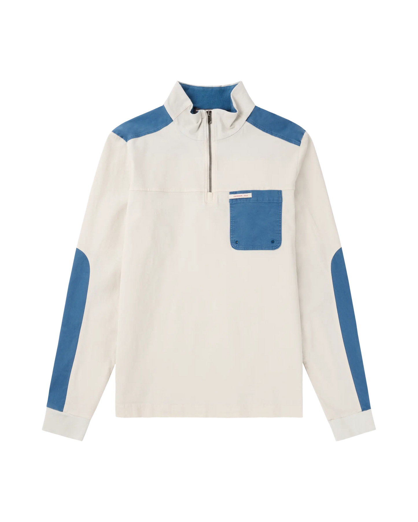 Built for warm‑weather adventures and everyday wear. The Ditch‑hiker Pullover blends natural breathability with easy stretch. Cut from cotton twill with a touch of elastane, it’s pigment‑dyed, enzyme‑washed and brushed for a soft, broken‑in feel that develops a rich patina over time.
Designed in a clean half‑zip silhouette with a regular fit, it features stretch‑twill reinforcement at the shoulders and elbows for durability, a chest patch pocket for small essentials, and elasticated cuffs and hem to seal in