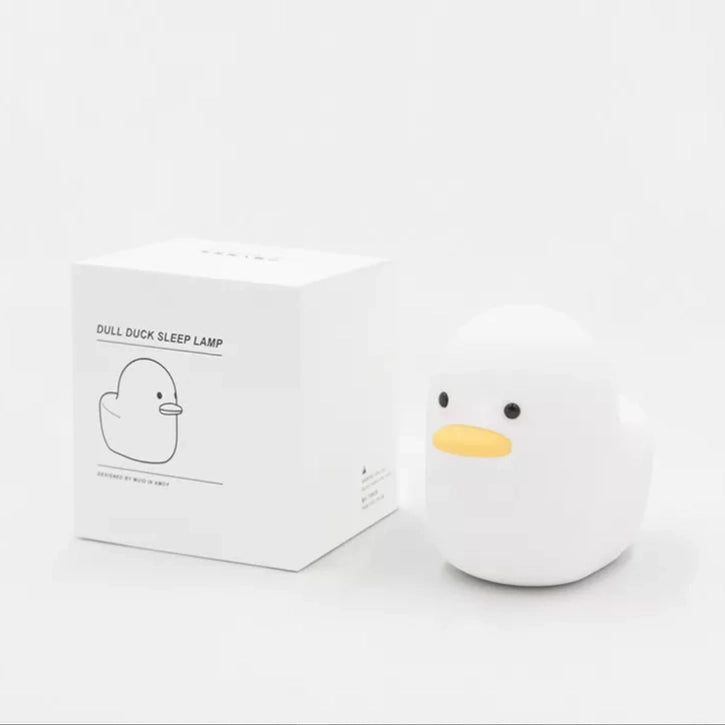 A small duck shaped night lamp designed to accompany you into sleep, a perfect LED night light as bedside table lamp, decoration for dorm, bedroom, nursery, and study room. It features adorable animal appearance, soft and smooth silicone material, comfortable warm yellow light, simple and time-delay switch for versatile and convenience use.