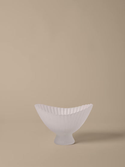 Large White ceramic bowl on a beige background