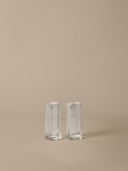 Tall glasses set of two on beige background