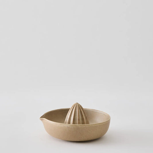 Lemon squeezer in stoneware made with a organic natural rounded shape that facilitates efficient juicing. It is part of the Palermo stoneware series and will make a stylish and functional addition to your kitchen.