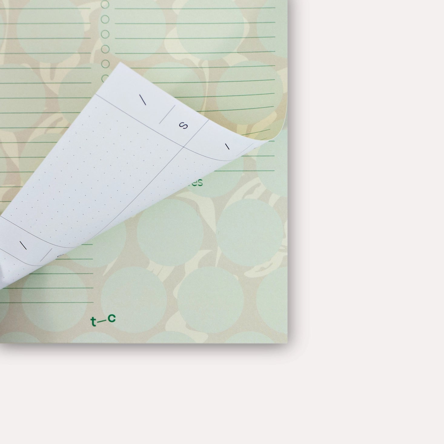 The Marfa Daily Planner Pad is a desk-essential for modern, design-savvy minds.
Featuring the Marfa print - chocolate base with butter-yellow abstract leaf print covered in green polka dots - it brings the SS2026 collection’s warm, layered, slightly hazy energy to your everyday planning.