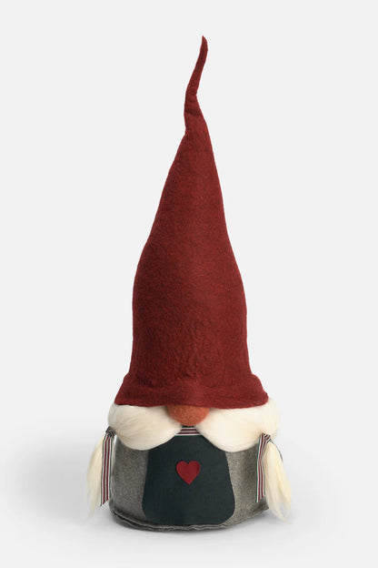 Born in the small Swedish town of Gislaved, Åsa Tomtebod AB began as a one-woman dream and a handful of hand-felted, bearded elves crafted at a kitchen sink. What started in 1993 as a tiny shop selling local goods transformed into an internationally loved brand after Åsa’s charming Bearded Elves captured hearts across Sweden and far beyond. Each gnome carries the spirit of its humble origins—care, craft, and the quiet magic of Swedish tradition. Today, Åsa Tomtebod celebrates over 30 years of creating whims