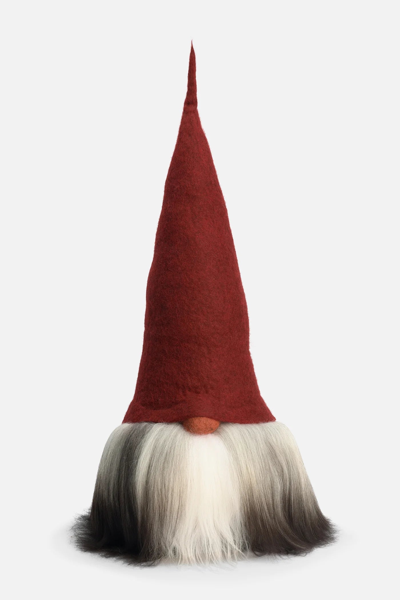 Born in the small Swedish town of Gislaved, Åsa Tomtebod AB began as a one-woman dream and a handful of hand-felted, bearded elves crafted at a kitchen sink. What started in 1993 as a tiny shop selling local goods transformed into an internationally loved brand after Åsa’s charming Bearded Elves captured hearts across Sweden and far beyond. Each gnome carries the spirit of its humble origins—care, craft, and the quiet magic of Swedish tradition. Today, Åsa Tomtebod celebrates over 30 years of creating whims