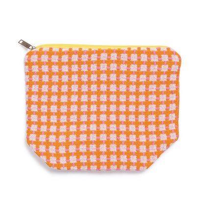 Small pouch with orange and white checkered pattern on a white background