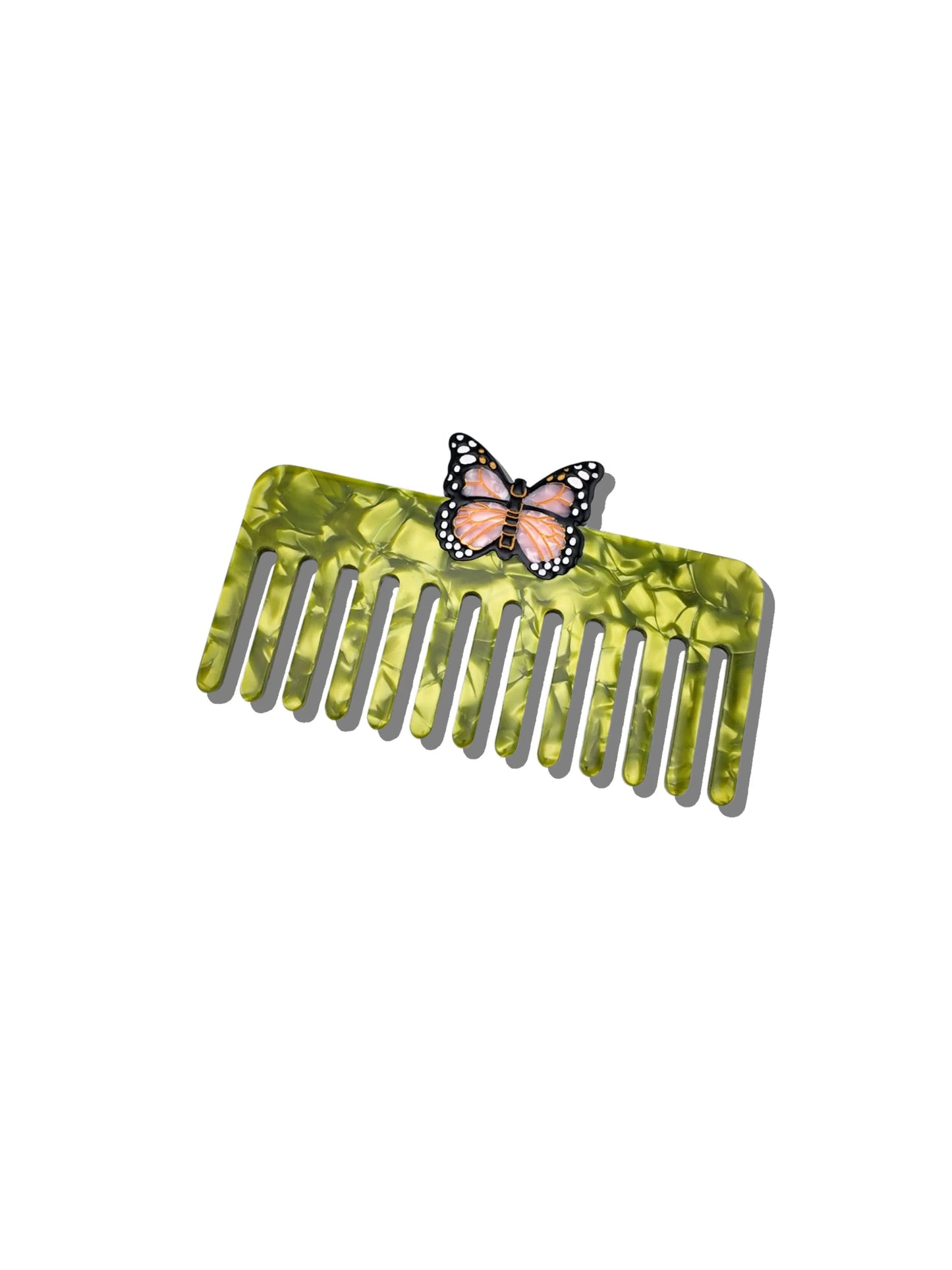 The Pink Butterfly Pocket Comb brings effortless scandi cool to your everyday essentials. Compact and bold, it’s ready to go wherever you do—with a touch of natural beauty and butterfly flair.
