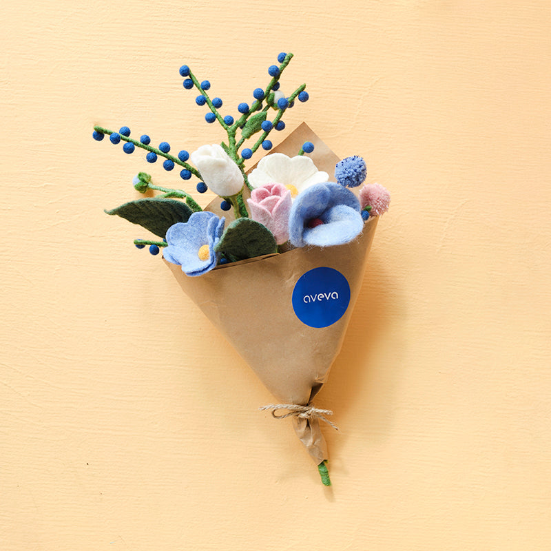 Aveva Wool Flower Bouquets that spark joy and will last you a lifetime. No more having to re buy flowers to fill the empty vases around your home, you can bring a touch of nature inside with colorful bouquets made with sustainable wool. This is the Poro bouquet made in sweden with blue, pink, and white florals. 