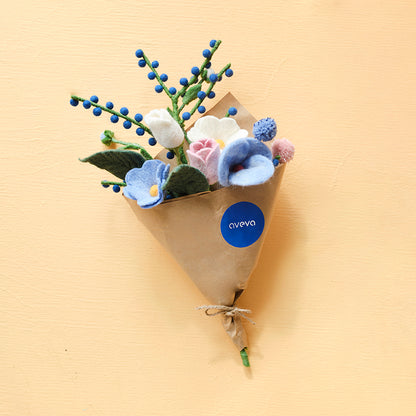 Aveva Wool Flower Bouquets that spark joy and will last you a lifetime. No more having to re buy flowers to fill the empty vases around your home, you can bring a touch of nature inside with colorful bouquets made with sustainable wool. This is the Poro bouquet made in sweden with blue, pink, and white florals. 