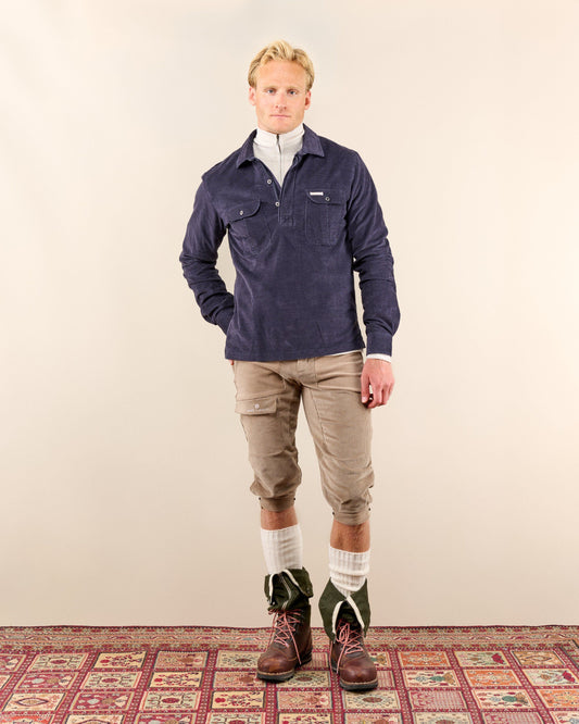 Experience versatile comfort in our Ranger Velvet Half-Zip Shirt. Crafted from thin-needle stretchy corduroy grid provides a distinctive texture and comfortable 2-way stretch that moves with you through all seasons. The half-zip design offers versatile temperature regulation whether you're traversing mountain trails or navigating city streets. Pre-broken in for immediate comfort, this cotton-rich blend delivers a relaxed yet put-together look that transitions effortlessly from outdoor pursuits to casual gat