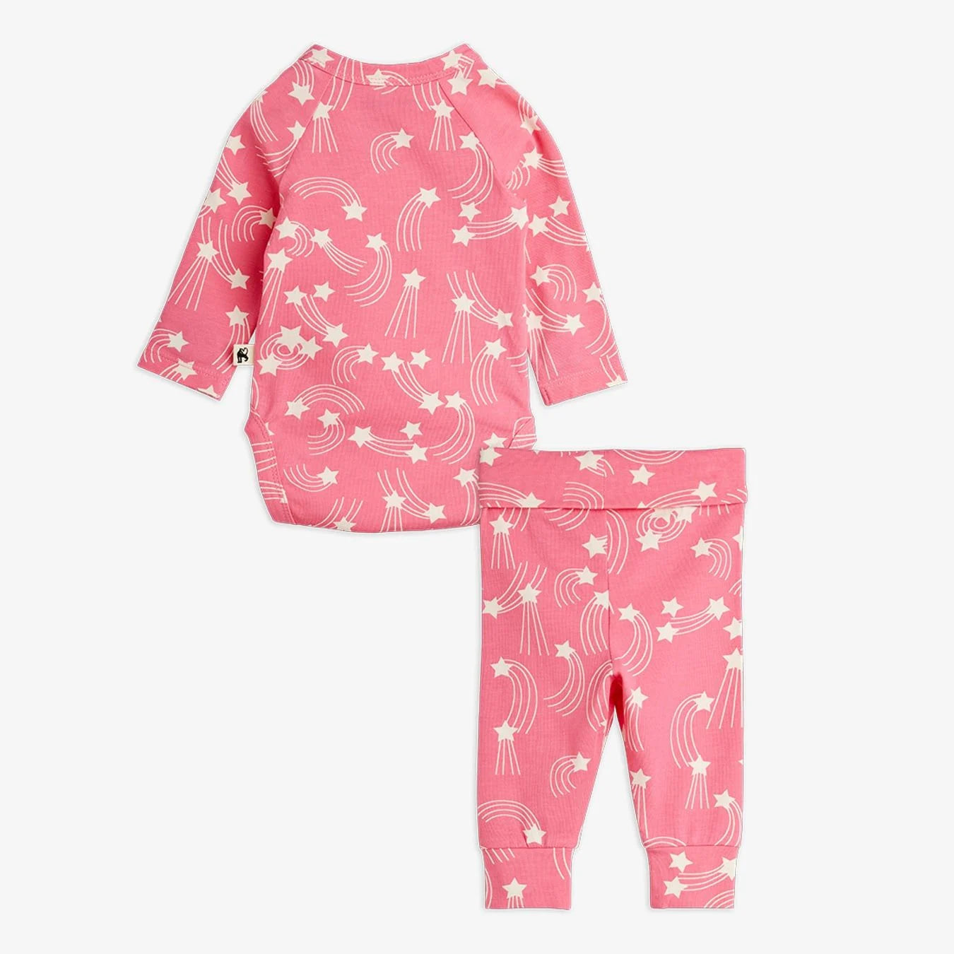 Pink children's pajama set with white star pattern on a white background