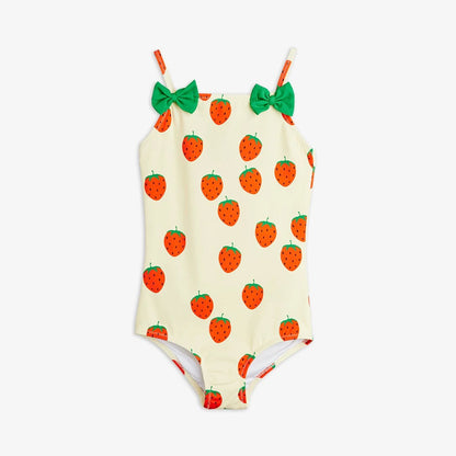 One-piece swimsuit with strawberry pattern and green bows on a white background