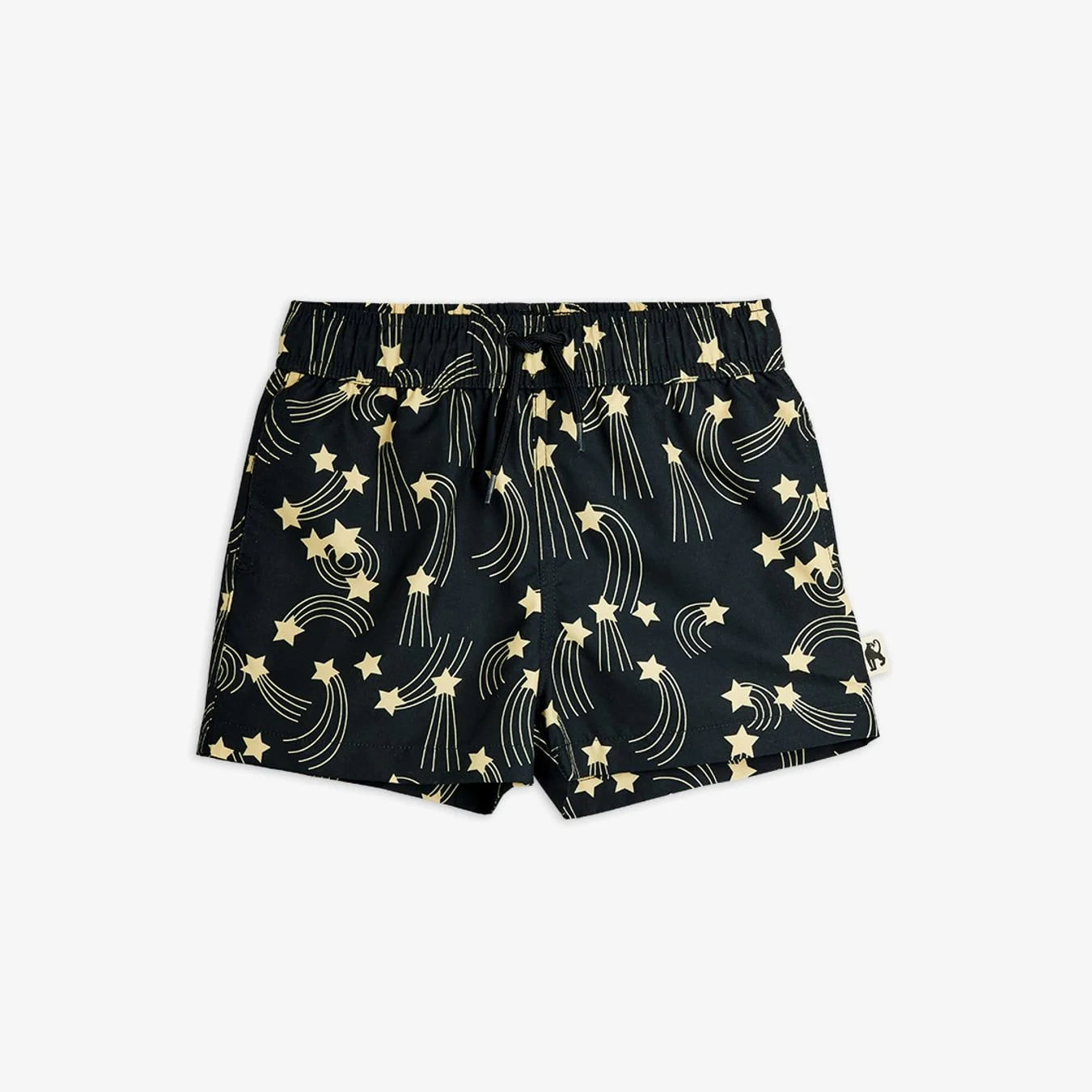 Black shorts with gold star and moon pattern on a white background