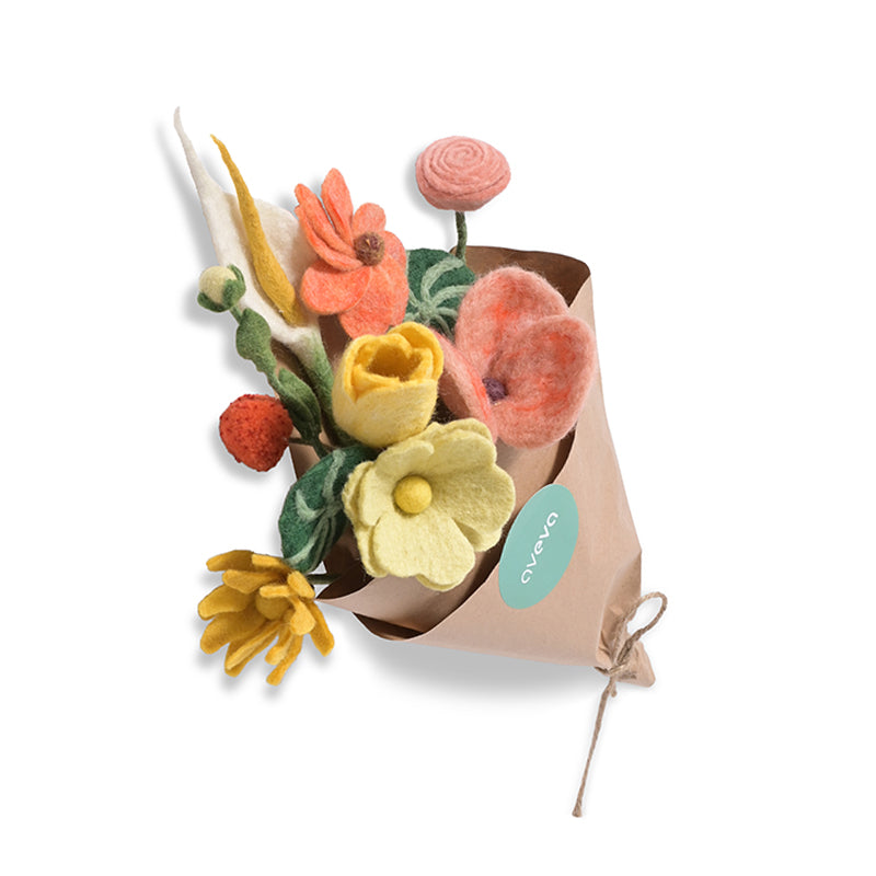 Aveva Wool Flower Bouquets that spark joy and will last you a lifetime. No more having to re buy flowers to fill the empty vases around your home, you can bring a touch of nature inside with colorful bouquets made with sustainable wool. This is the Sydney bouquet with a mix of orange and yellow and green. 