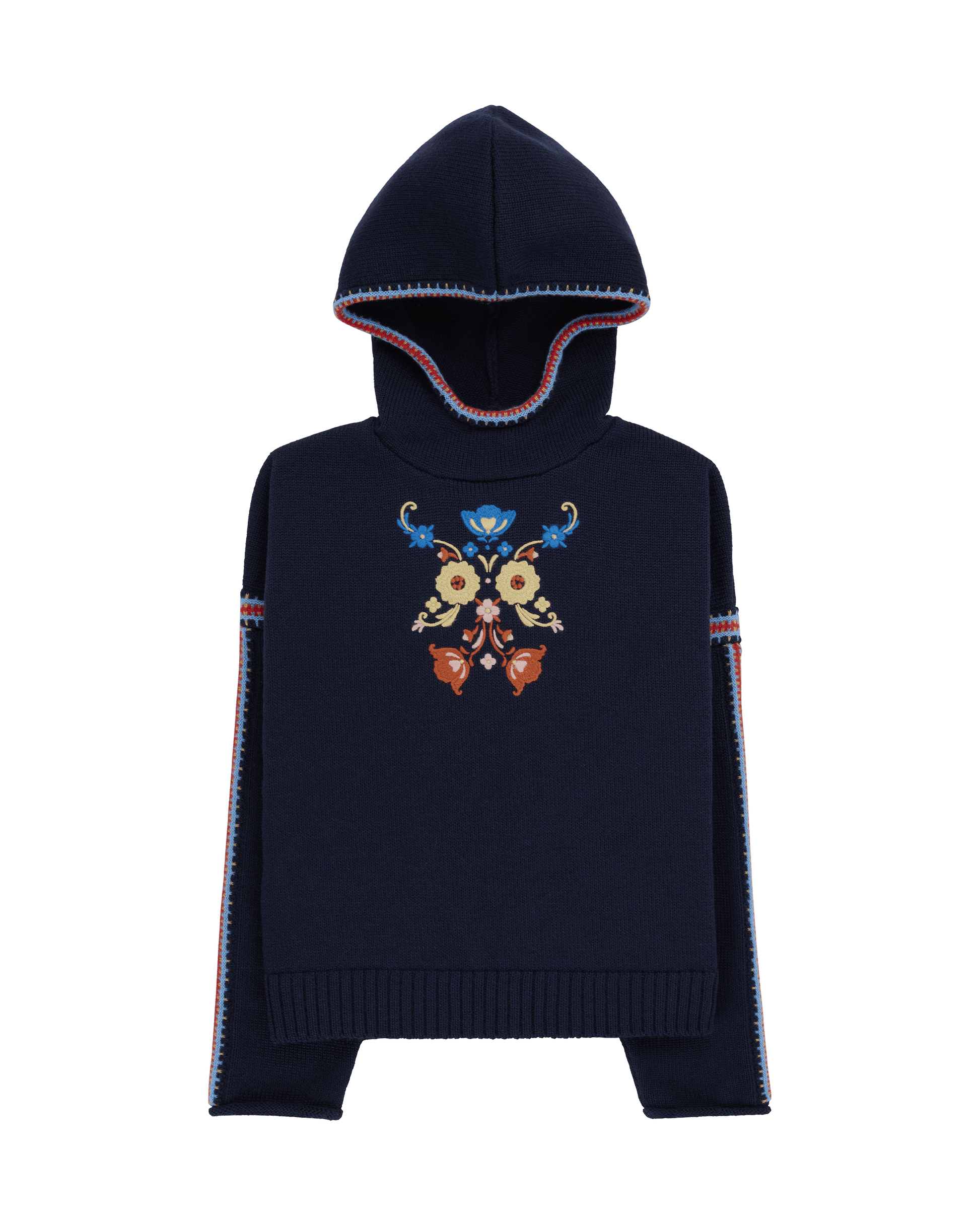 Two women sitting in a snowy landscape, wearing embroidered clothing, a true tribute to Norwegian heritage. This hooded sweater is crafted from 100% Norwegian wool, sourced from free-ranging sheep, and features embroidered motifs inspired by the traditional Norwegian Bunad of Telemark, Hallingdal, and Gudbrandsdalen.